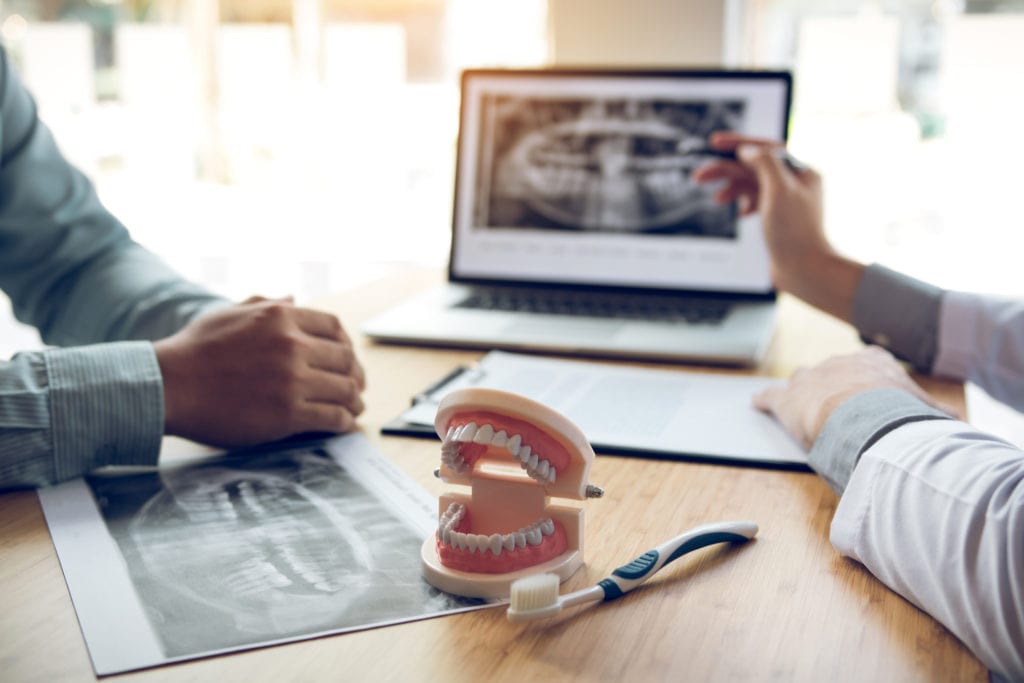 Dental Implants vs Dentures in Greeley Colorado